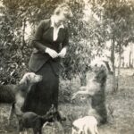 Principal Minnie Roseby and her dogs, c. 1916